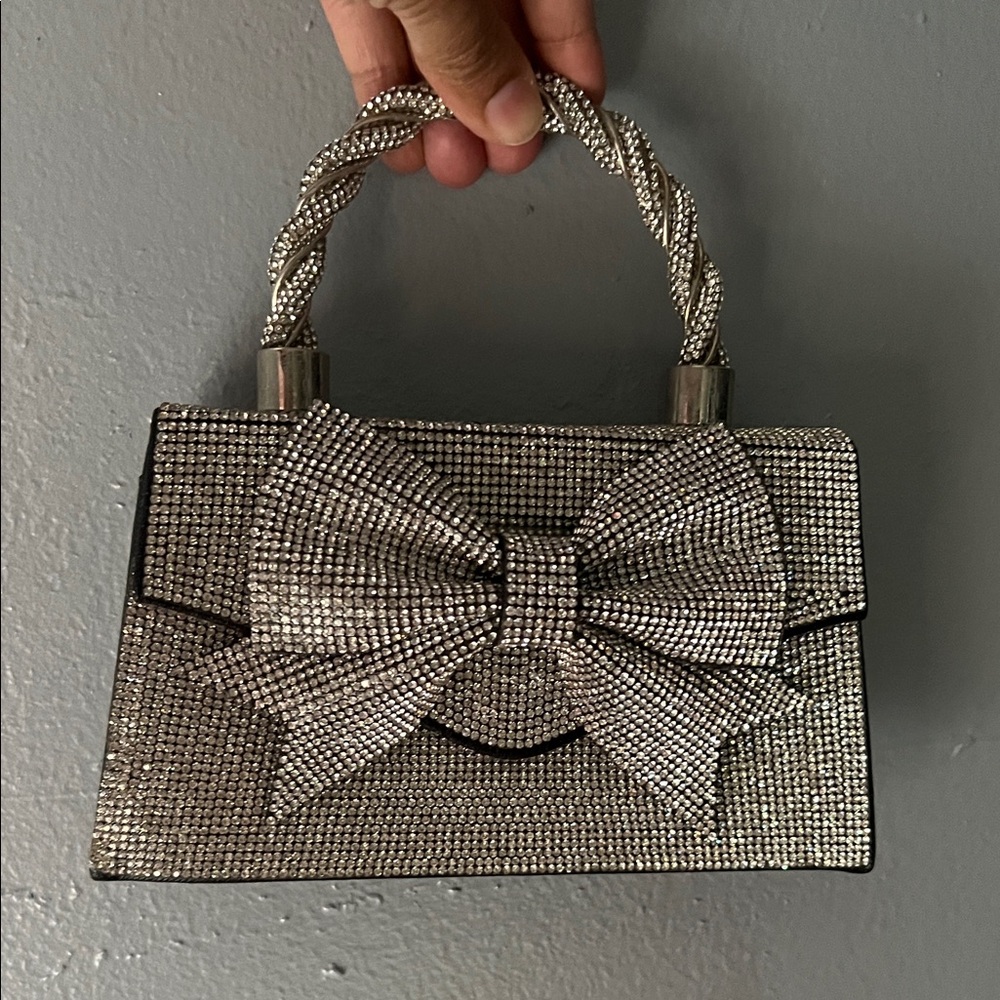 Elegant Silver Bow Handbag
